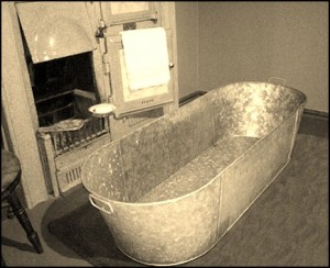 Although Cecil had access to the modern bath of the time, most were using the tin bath in front of the fire.