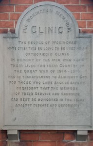 The engraved stone is placed on the front of the old clinic in Denmark Street